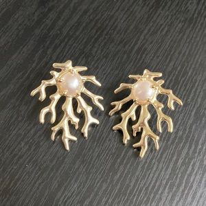 Kendra Scott Pearl statement earrings with coral gold accents.